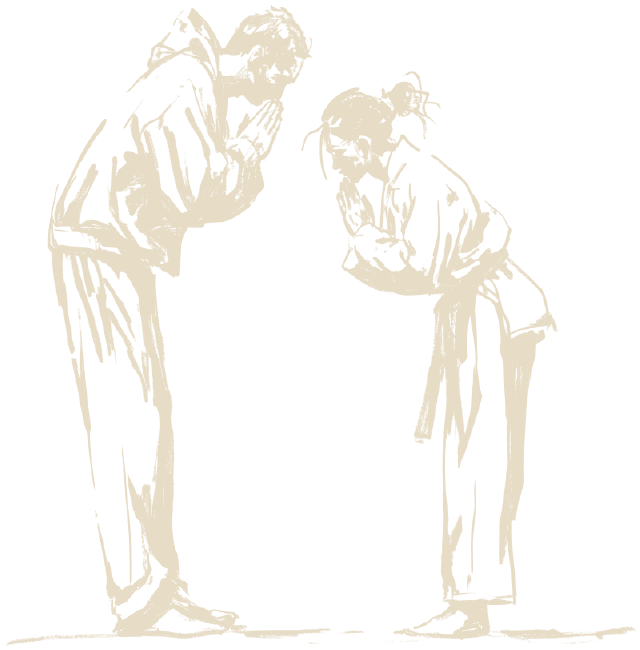 Two figures bowing to each other, hands together.